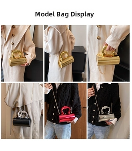 Cylindrical candy-colored bag with heart metal handle and chain strap styling