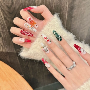 Handmade gingerbread man Christmas press-on nails with 3D festive charms and pearls