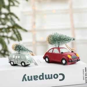 Creative Christmas miniature resin car ornaments with snowy trees on decorative books