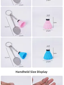 Detailed size comparison of pink and blue mini badminton racket keychain pendants