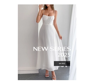 Detail of white bustier maxi dress featuring slim straps and textured pleated fabric