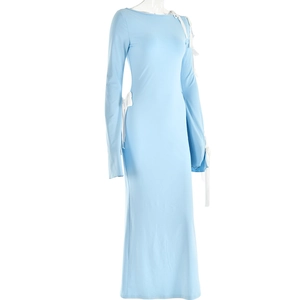 Detail of light blue dress with white lace-up ribbons on off-shoulder sleeves