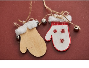 Close-up of wooden Christmas glove ornaments with bells and natural hemp hanging ropes