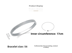 Detail view of 0.55cm wide silver textured bangle with 17cm circumference dimensions
