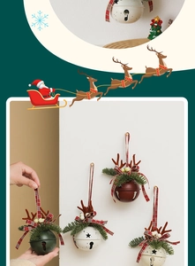 Detailed Christmas metal bell ornaments with pine needles, antlers, and ribbon ties