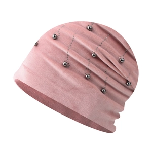 Detailed view of pink chenille beanie with silver beads in a meteor pattern