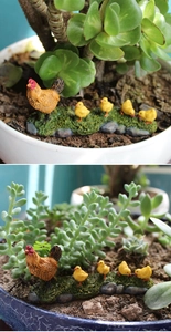 Miniature resin hen and yellow chicks figurines on moss base for succulent garden decor