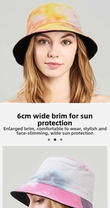 Detail of 6cm wide brim on cotton tie-dye bucket hat showing vibrant colorful patterns