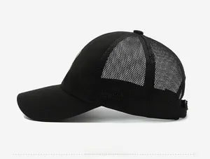 Side view of black mesh baseball cap showing breathable panel and adjustable strap