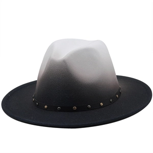 Close-up of fedora hat featuring gradient felt texture and metal studded leather band