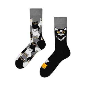 Creative mismatched crew socks with cartoon cat and mouse patterns in black and white