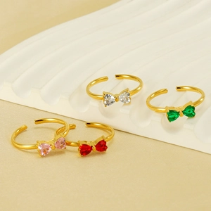Eleganti anelli a fiocco placcati oro 18K con zirconi a forma di cuore in quattro colori
