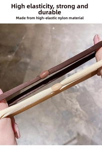 Detail showing high-elasticity nylon hair ties being stretched for durability