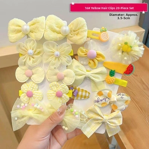 20-piece yellow hair clip set for girls featuring ribbon bows and sunflower patterns