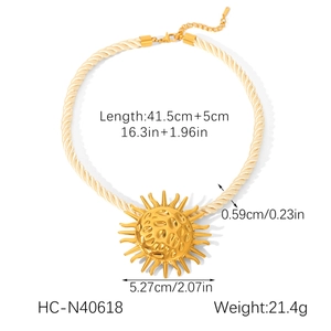 Detailed view of sun pendant necklace with size measurements and cord thickness info