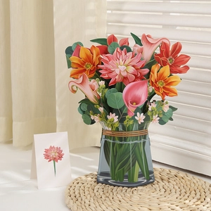 Detail of 3D pop-up greeting card featuring paper dahlia and calla lily flower bouquet