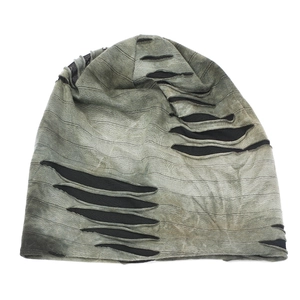 Distressed grey-green tie-dye knitted beanie with ripped texture and street style