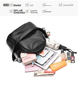 Black soft leather backpack interior layout showing large storage capacity and details