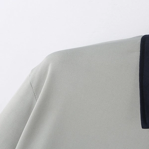 Detail shot of breathable mesh fabric on a grey and navy slim fit long sleeve Polo shirt