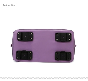Detail view of the waterproof travel bag base featuring four durable wear-resistant feet