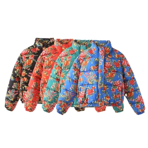 Detail view of four floral print puffer jackets in black, red, green, and blue colors