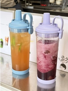 Detail of Tritan boba cups with wide straws, magnetic handles and non-slip silicone bases