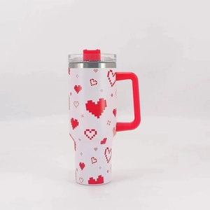 White 40oz stainless steel tumbler with red pixel heart and handle on white background