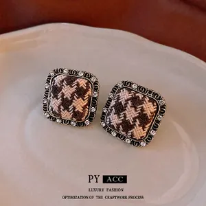 Square houndstooth earrings with sparkling rhinestones and retro metal frame in warm tones