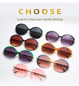 Detailed view of elastic frame sunglasses in various colors with round lens design
