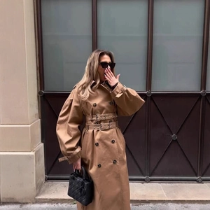 Classic khaki double-breasted long trench coat for women with stylish waist belt