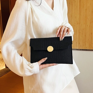 Minimalist black crocodile pattern envelope clutch bag with golden magnetic buckle