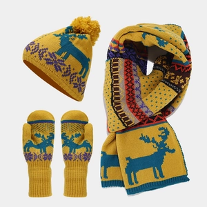 Detailed knit texture of ginger Christmas winter set featuring elk and geometric patterns