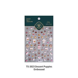 3D embossed dessert dog nail stickers featuring donuts and bows on white background