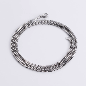 Close-up of a 1.5mm-3mm silver stainless steel box chain with a lobster clasp
