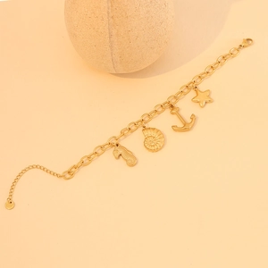 Golden ocean theme bracelet with seahorse, shell, anchor and starfish charms for women