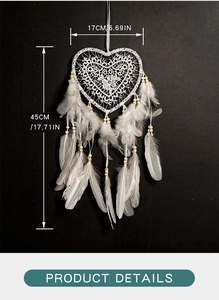 Detail view of heart-shaped dream catcher with white feathers and bead dimensions