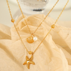 Double layer gold starfish shell necklace with pearl detail for summer beach vacation style