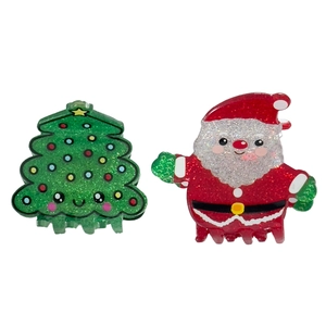 Festive Santa and Christmas tree hair claws with glitter finish for seasonal hairstyling
