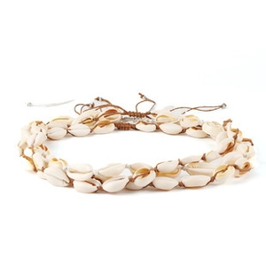 Detail of handmade bohemian shell necklace with natural white shells and woven brown cord