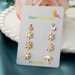 Rose gold stainless steel Christmas earring set with reindeer and snowflake studs