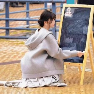 Women's oversized grey hooded long sweatshirt jacket in casual loose fit style