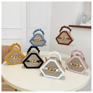 Detailed grid of woven straw hexagonal handbags in blue, brown, yellow, black, and white