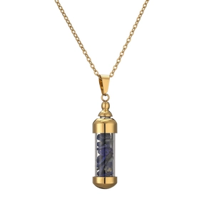 Detailed close-up of golden perfume bottle pendant filled with blue natural crystal stones