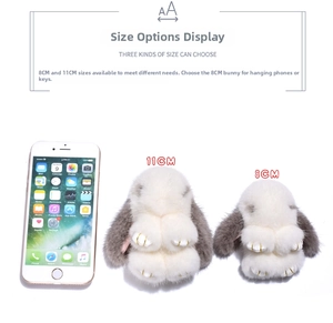 Plush bunny keychain size comparison with phone showing 8cm and 11cm variants