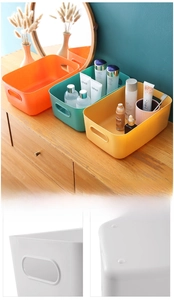 Close-up of durable plastic organizers with side handles and anti-slip bottom base