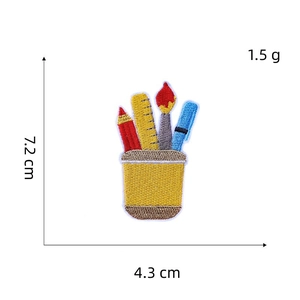 Detailed size map of stationery embroidery patch featuring pencil and ruler design