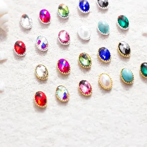 Strass ovales colorés avec cadres texturés or et argent pour décoration d'ongles