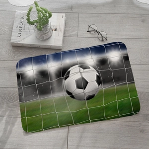 Soccer ball hitting the net themed absorbent flannel floor mat on light wood floor