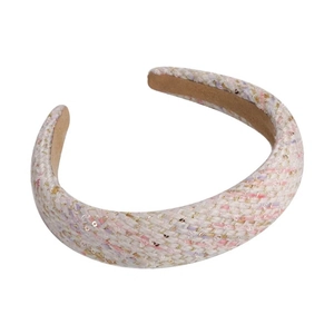 Pink tweed wide headband with gold accents and sequins for a high top hairstyle