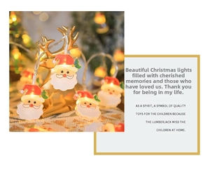 Close-up of Santa Claus LED string lights with warm yellow festive glow and reindeer decor
